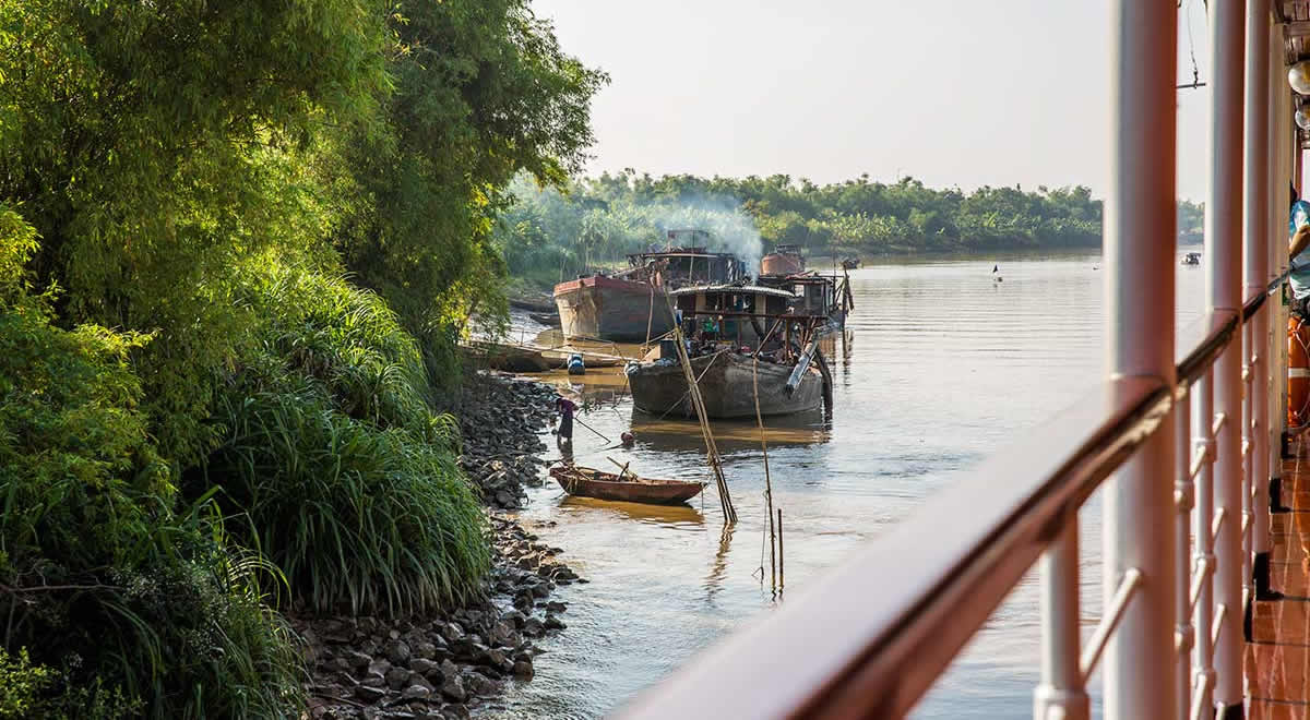 Locals’ vessels moored on the banks of the Duong River